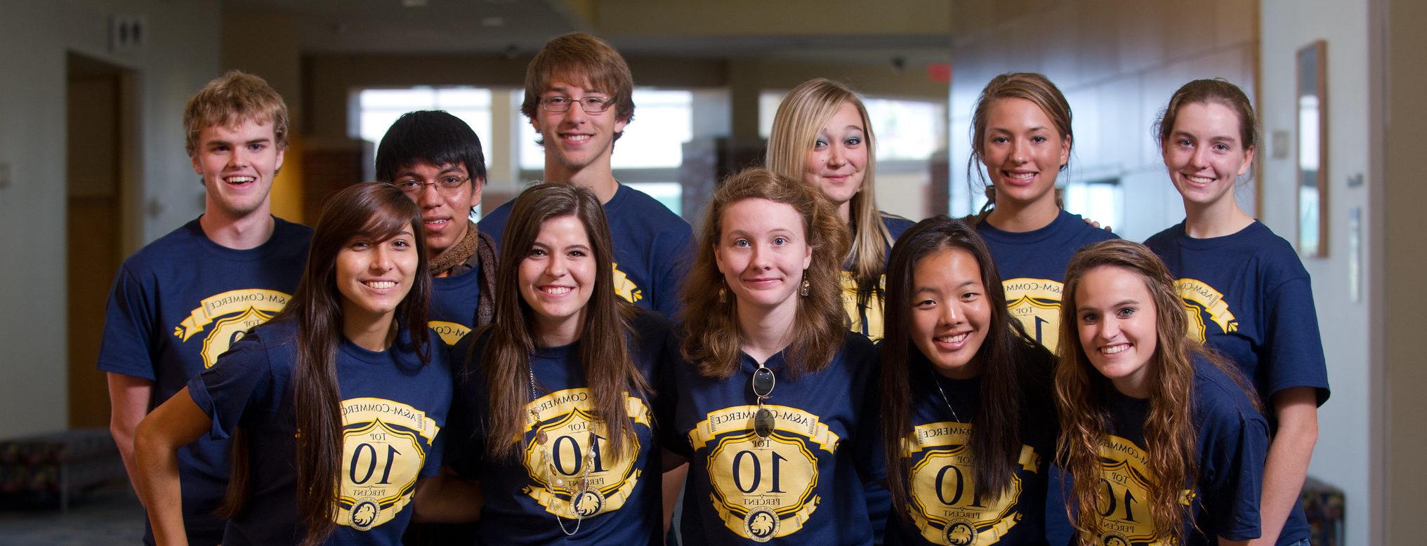 Group of High School students wearing shirts stating Top Ten Percent High School Students.